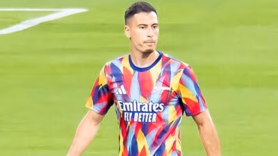 Arsenal forward Gabriel Martinelli in a multicoloured warm-up top