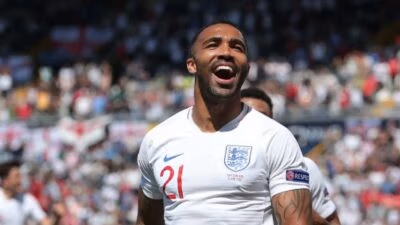 Callum Wilson celebrates scoring a goal for England