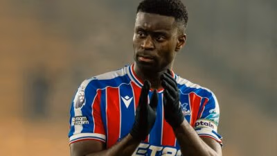 Marc Guehi applauds the Crystal Palace fans