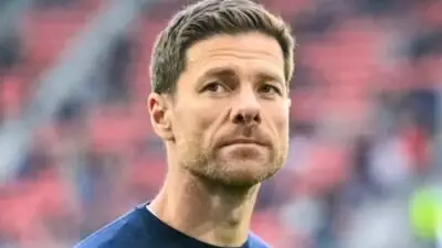 Former Bayer Leverkusen and Real Madrid manager Xabi Alonso walks across the pitch