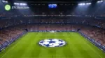 An aerial view of a football stadium on Champions League night