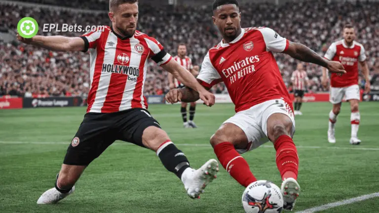 Um jogador do Brentford disputa a bola com o Arsenal