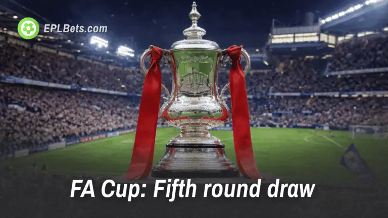 A picture of the FA Cup trophy against a stadium backdrop