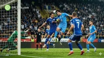Sandro Tonali and Ivan Sunic contest a header as Bosnia host Italy