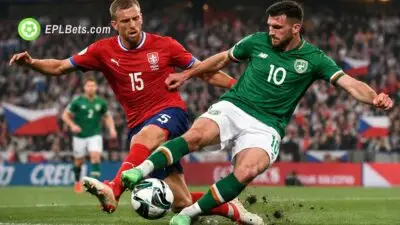 Tomas Soucek and Troy Parrott compete for the ball