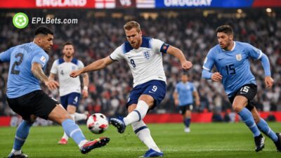 England's Harry Kane takes a shot against Uruguay