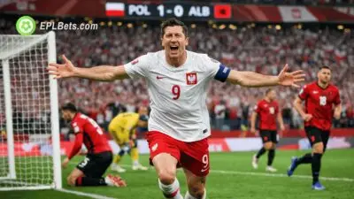 Robert Lewandowski celebrates scoring a Poland goal against Albania
