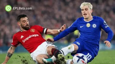 Bruno Fernandes of Man United tackles Chelsea's Alejandro Garnacho