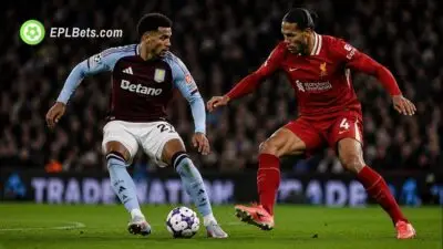 Morgan Rogers and Virgil Van Dijk battle it out.