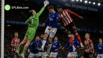 Nordi Mukiele in an aerial duel with Jordan Pickford from a corner.