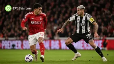 Morgan Gibbs-White dribbles past Bruno Guimarães