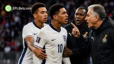 Morgan Rogers holds back Jude Belligham in clash with Ghana bench.