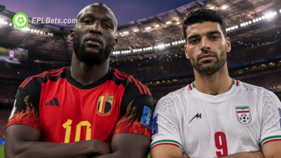 Romelu Lukaku of Belgium, shoulder-to-shoulder with Mehdi Taremi of Iran in the build up to a vital Group G game