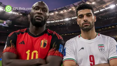 Romelu Lukaku of Belgium, shoulder-to-shoulder with Mehdi Taremi of Iran in the build up to a vital Group G game