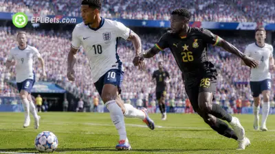 Jude Bellingham of England skipping past Alidu Seidu of Ghana on the edge of the box