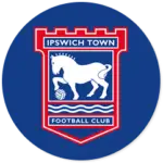 An Ipswich Town club crest on an blue circle