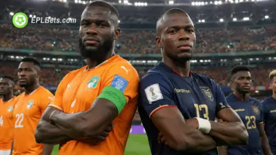 Franck Kessie of Ivory Coast and Enner Valencia of Ecuador back to back, facing the camera
