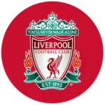 A Liverpool club crest on a red circle