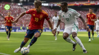Lamine Yamal of Spain and Michael Saud Abdulhamid of Saudi Arabia challenge for the ball in Group H