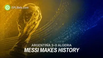 An image of the World Cup with the text 'Messi makes history'