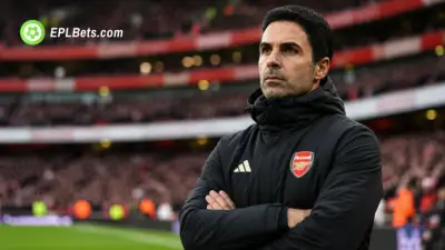 Arsenal manager Mikel Arteta standing pitch-side