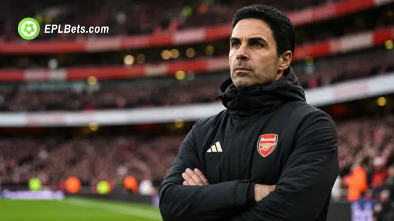 Arsenal manager Mikel Arteta standing pitch-side