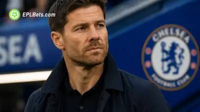 Chelsea manager Xabi Alonso standing pitch-side