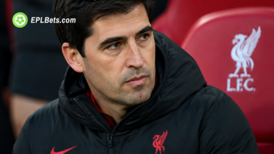 Liverpool manager Andoni Iraola sitting in the dug-out