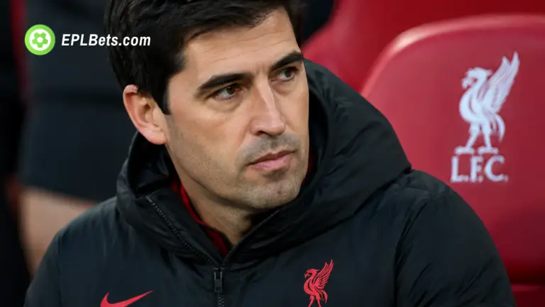 Liverpool manager Andoni Iraola sitting in the dug-out