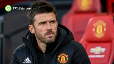 Manchester United manager Michael Carrick sitting in the dug-out