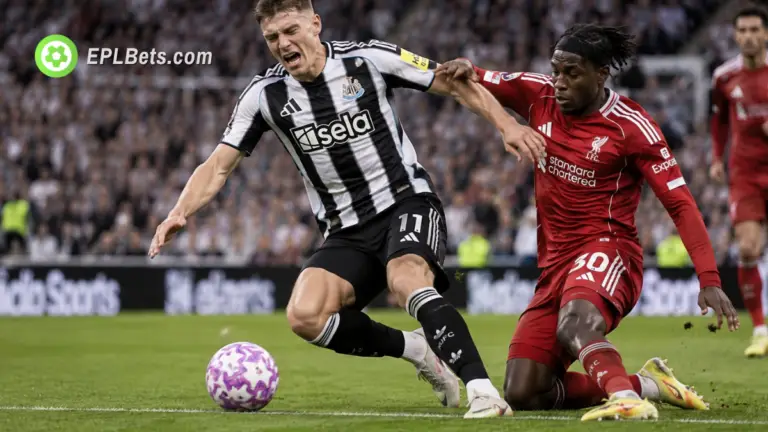 Harvey Barnes of Newcastle being fouled by Jeremie Frimpong of Liverpool