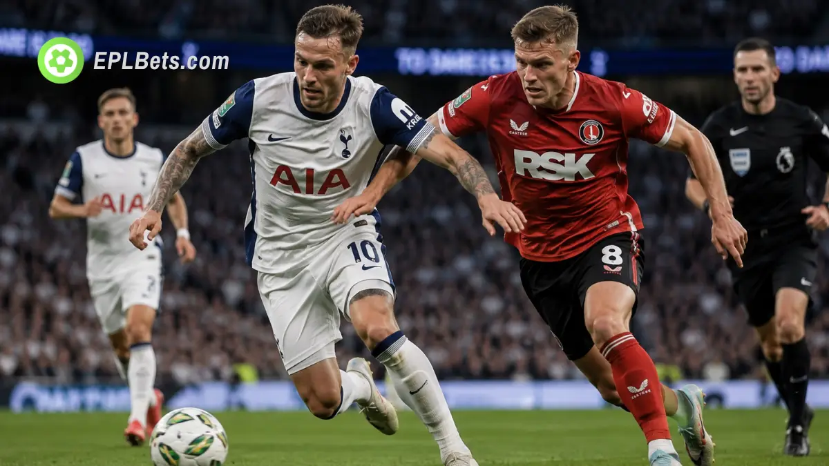 James Maddison of Tottenham, and Greg Docherty of Charlton, chasing a ball in a packed Tottenham Hotspur Stadium