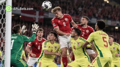 Denmark and Wales players compete for a header from a corner during their UEFA Nations League clash in Copenhagen.