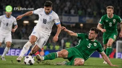 Republic of Ireland defender slides in to challenge an Israel player for the ball during their UEFA Nations League clash.