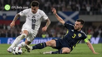 Slovenia and Scotland players challenge for the ball during a UEFA Nations League match in Ljubljana.
