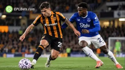 Hull City and Everton players battle for possession during a Premier League match at the MKM Stadium.