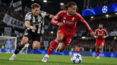 Liverpool winger Bradley Barcola dribbles past a LASK defender during a UEFA Champions League clash in Austria.