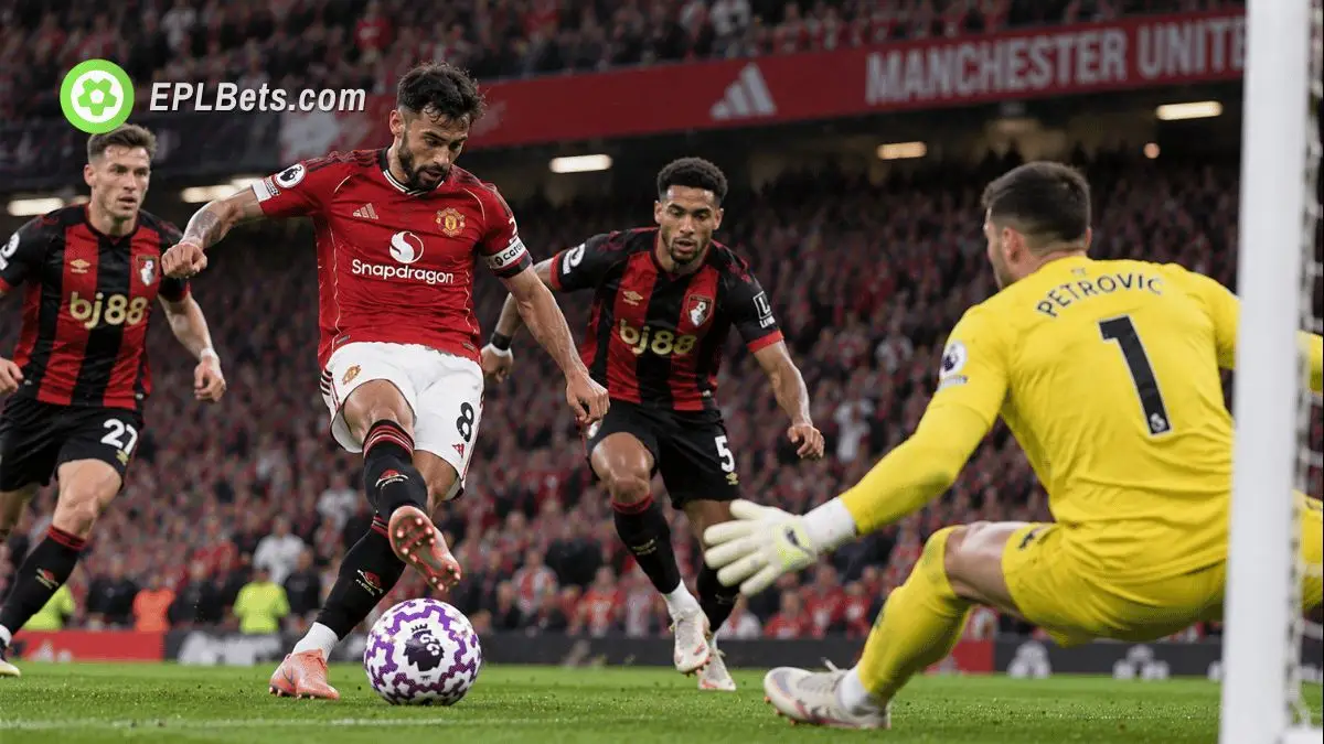 Manchester United captain Bruno Fernandes attempts a shot on goal as Bournemouth goalkeeper Djordje Petrović closes him down during a Premier League match at Old Trafford.